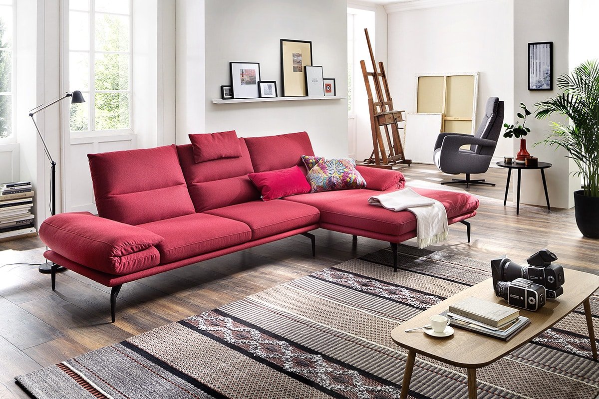 Great examples of how to add a red sofa to