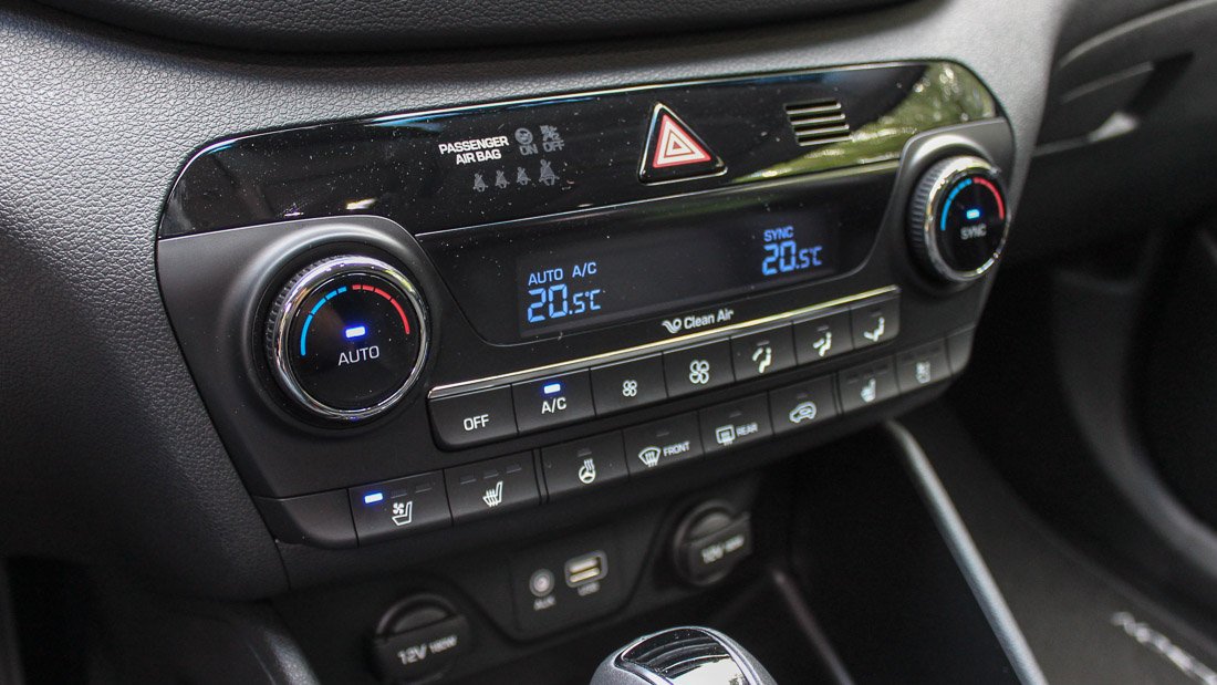 What does the AC button air conditioning mean